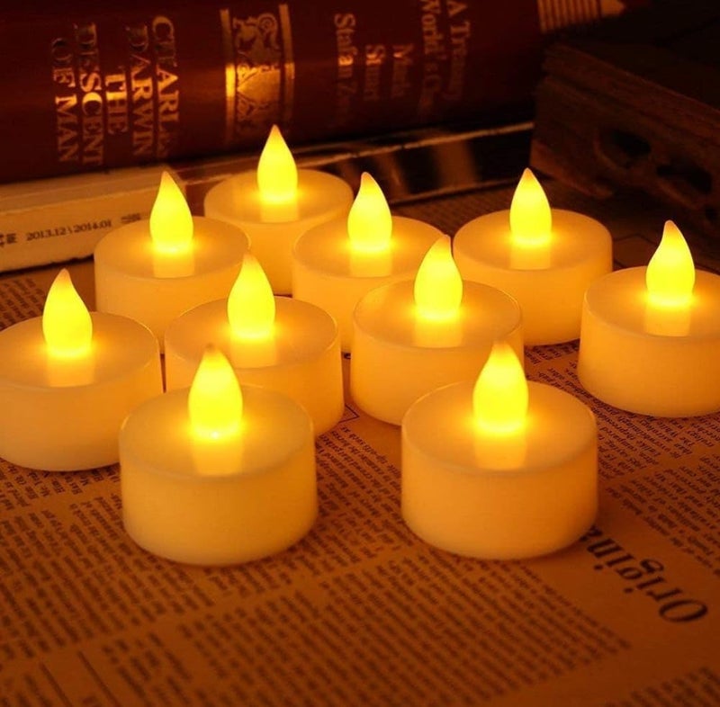 FLOPRO Set of 12 LED Flameless Candles for Diwali Warm Yellow Light - Image 1