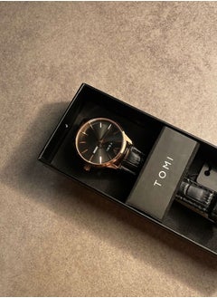 TOMI TOMI watch with a black leather strap for women that displays the date and day on a daily basis  - Image 3