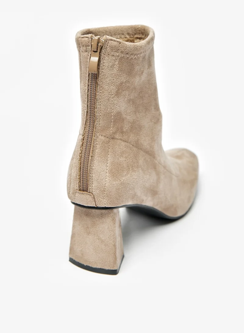 فلورا بيلا من شو إكسبرس Womens Solid Boots With Flared Heels And Zip Closure By Shoexpress