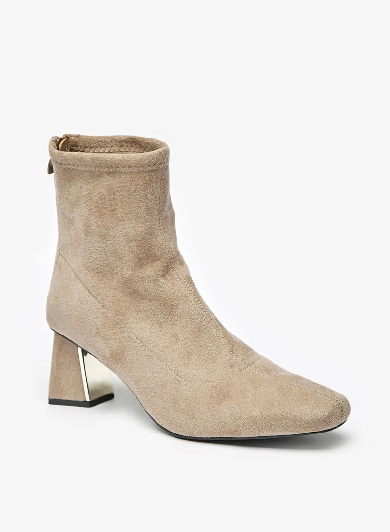 فلورا بيلا من شو إكسبرس Womens Solid Boots With Flared Heels And Zip Closure By Shoexpress