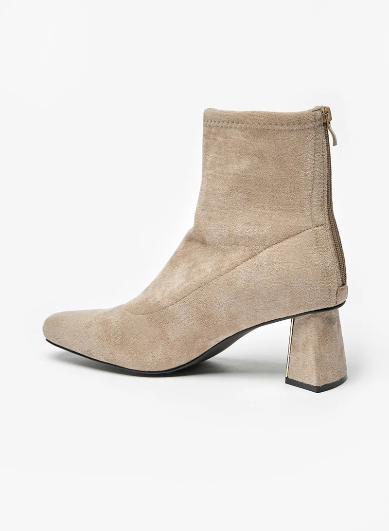 فلورا بيلا من شو إكسبرس Womens Solid Boots With Flared Heels And Zip Closure By Shoexpress
