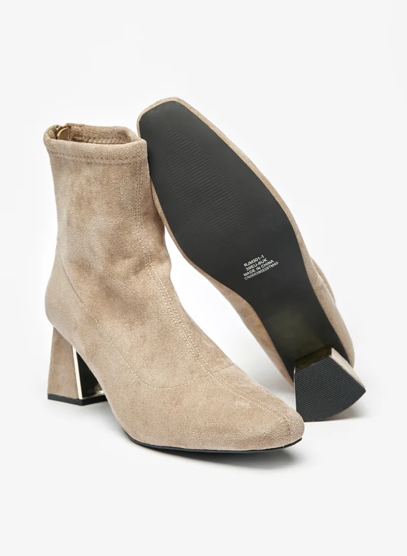 فلورا بيلا من شو إكسبرس Womens Solid Boots With Flared Heels And Zip Closure By Shoexpress