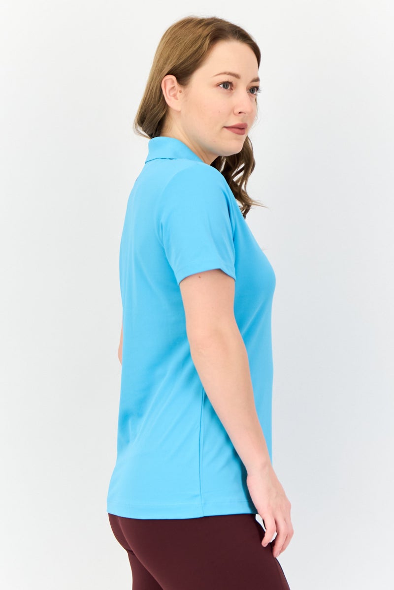 Greg Norman Women Sportswear Fit Solid Short Sleeves Outdoor Polo Shirt, Light Blue  - Image 4