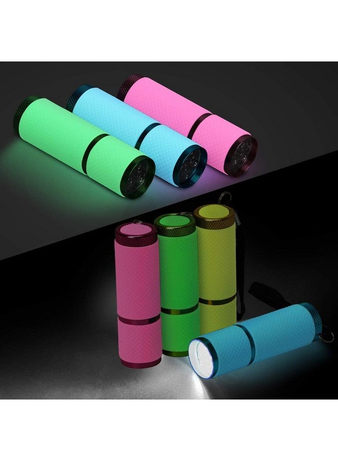 Ahier AHIER 9 LED Glow in Dark Flashlights, 4 Pack Rubber Coated Small Flashlights with Straps, Portable Handy Lights for Camping, Hiking, Indoor, Assorted Colors  - Image 4