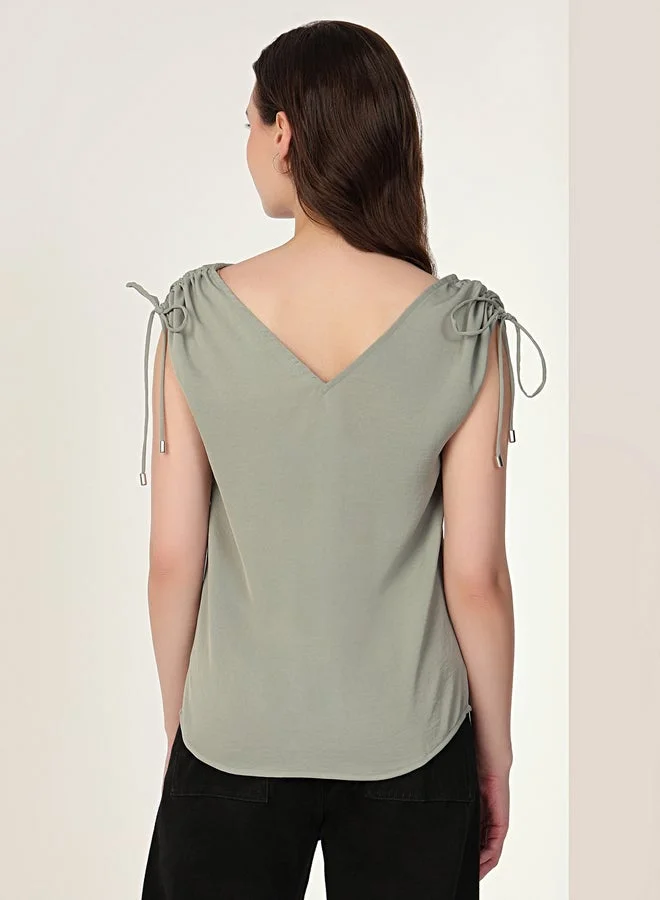 Mish  Green Tie-Up Details Sleeveless Top for Women | Best Price UAE
