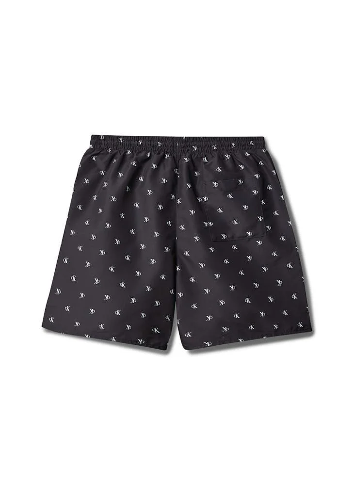 Calvin Klein Jeans Diamond Logo Black Mid Length Print Swim Shorts for Men | Best Price UAE
