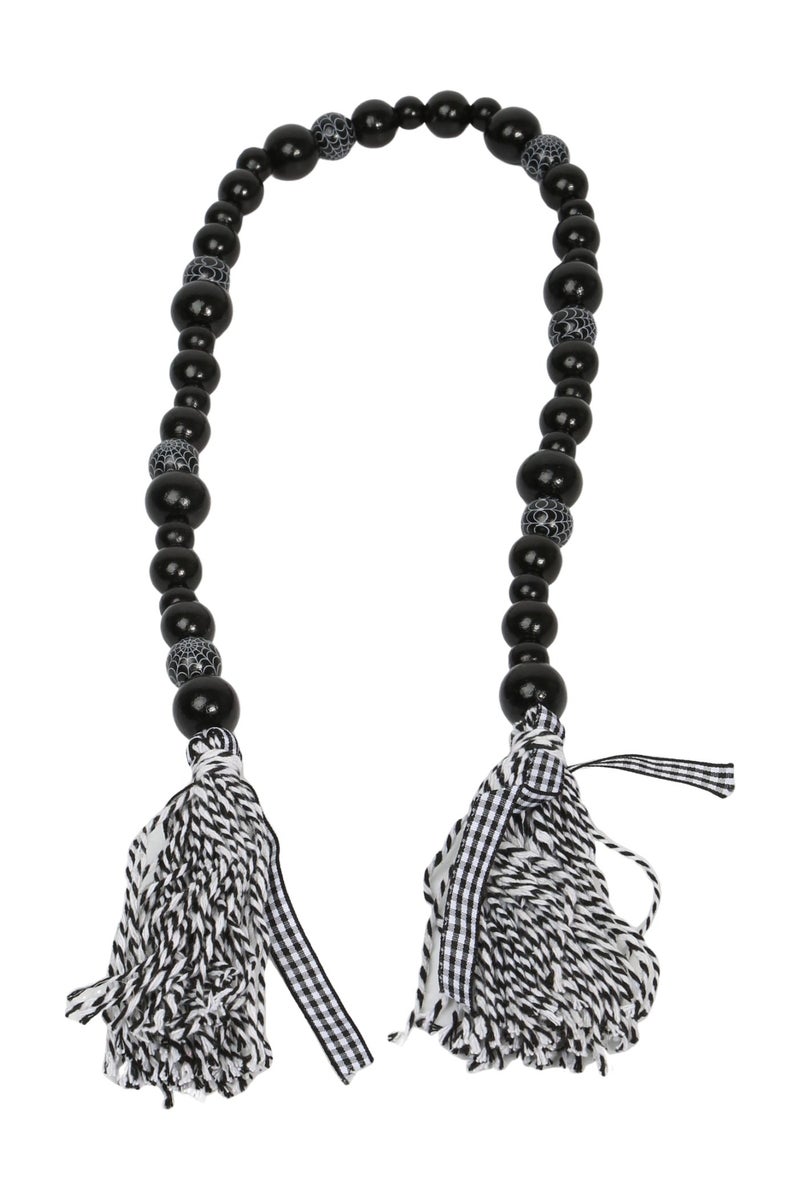 قلادة أنيقة بتصميم فريد مصنوع من خرز أسود لامع بأحجام مختلفة - Image 1