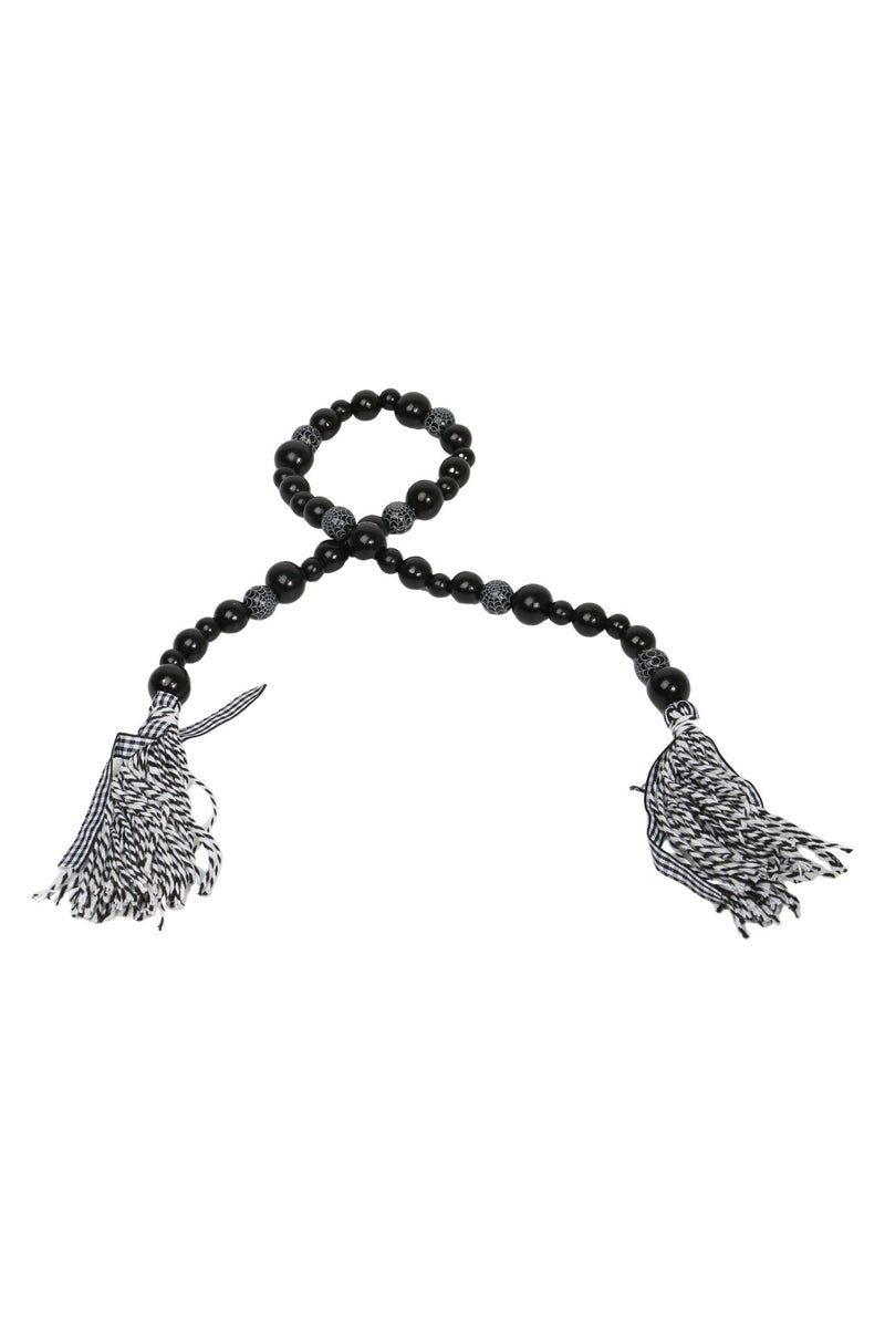 قلادة أنيقة بتصميم فريد مصنوع من خرز أسود لامع بأحجام مختلفة - Image 3