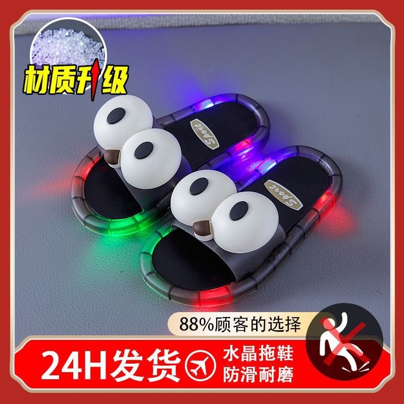 Chuang Xing Jia شباشب أطفال صيفية مضيئة بتصميم كرتوني - نعل ناعم، مقاوم للانزلاق، أحذية مضيئة للاستخدام الداخلي والخارجي - نسخة مطورة متوهجة عيون كبيرة سوداء - Image 1