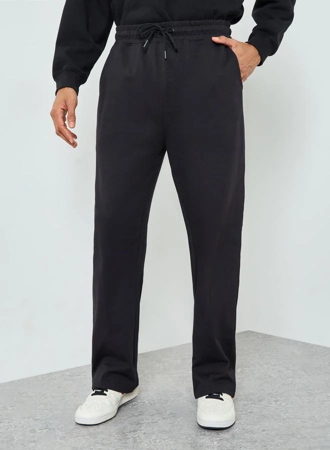 Men Black Solid Drawstring Joggers