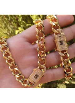 Monaco Set – A luxurious set consisting of a gold chain and bracelet with a distinctive modern design, adorned with shiny, elegant details and a sophisticated clasp, adding a touch of glamour and charm to your look for any occasion!