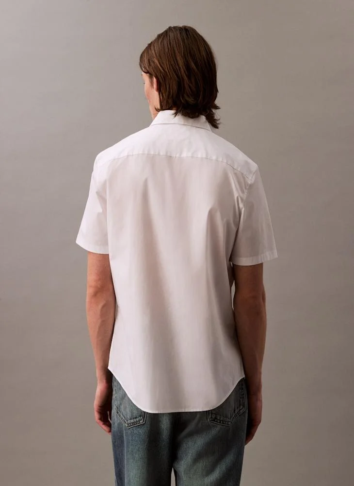 كالفن كلاين قميص قطني ضيق مطاطي