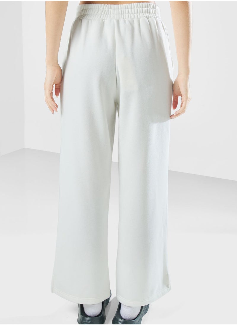 The Giving Movement - Wide Leg Logo Joggers - Image 1