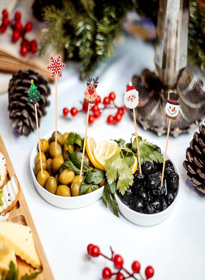 وولاين مجموعة Whaline من 120 قطعة من أعواد تزيين الكوكتيل لعيد الميلاد، 6 أشكال متنوعة: بابا نويل، غزال، رجل ثلج، أعواد أسنان مصنوعة يدويًا من الخيزران، أعواد تزيين لعيد الميلاد، زينة للكب كيك، أعواد تقليب للمشروبات، مثالية للمقبلات والفواكه، ديكور حفلات الأعياد - Image 4