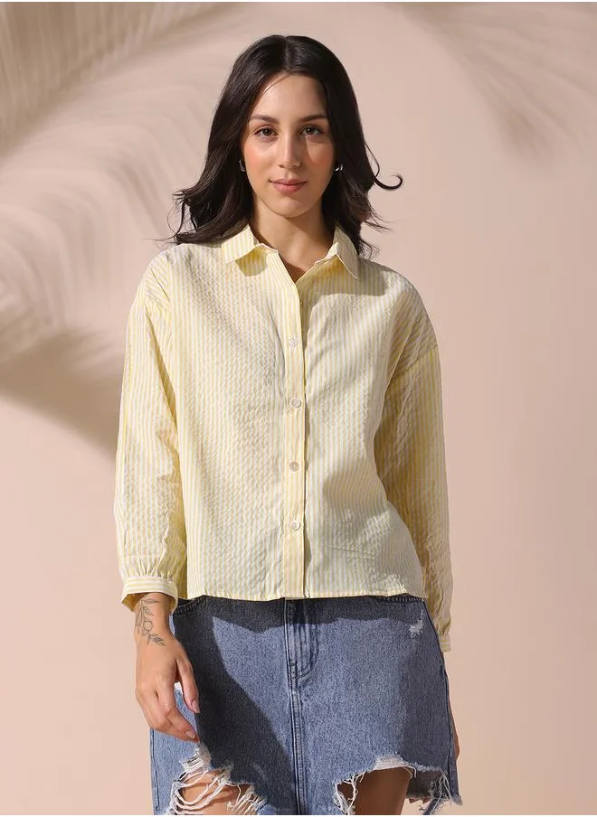 Dennis Lingo Women yellow relaxed fit striped full sleeves button down cotton blend shirts with button closure featuring a spread collar- a fresh take on timeless style.