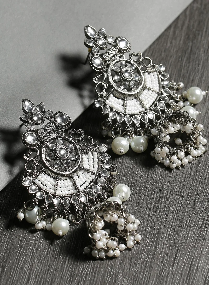 سوهي أقراط متدلية مرصعة بحجر أبيض مؤكسد