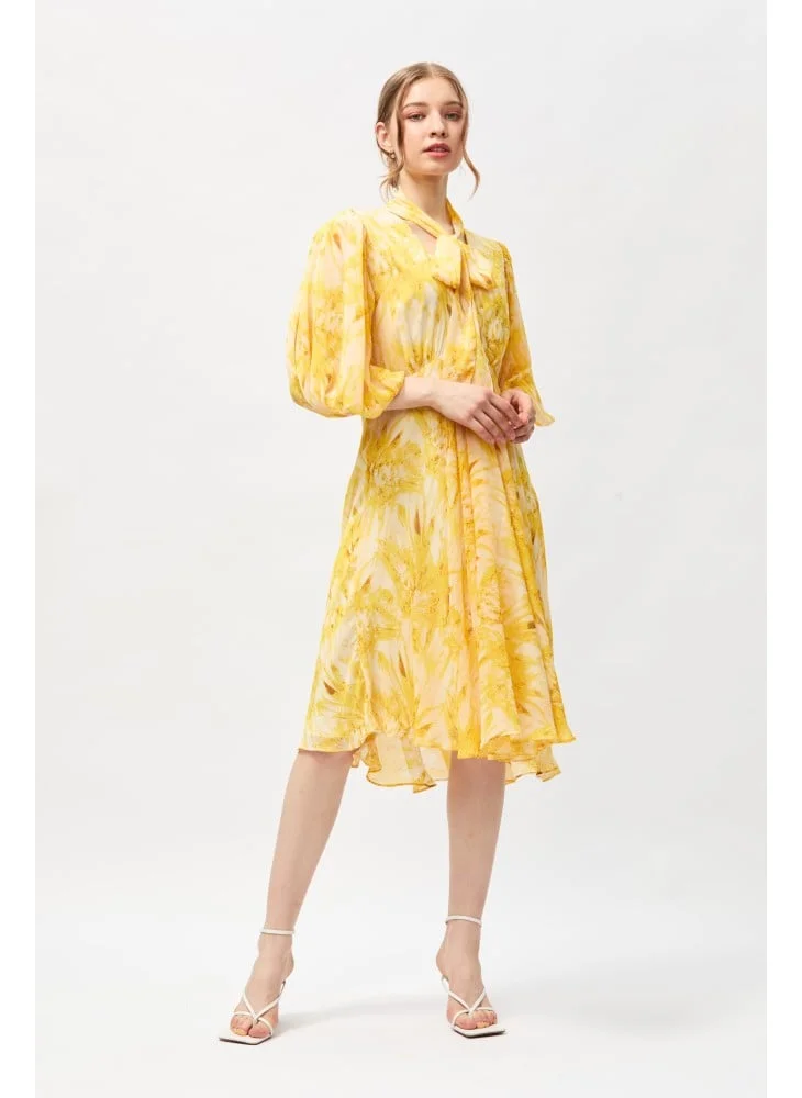 Tenda Floral dress with tied collar