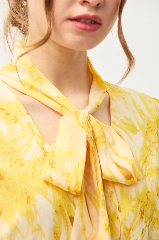 Tenda Floral dress with tied collar