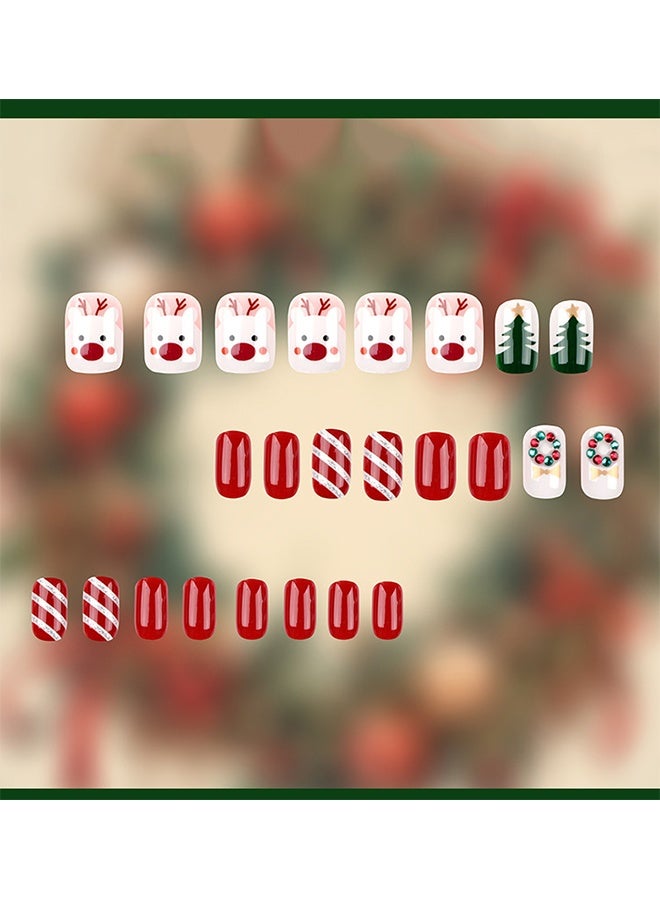 أظافر صناعية لعيد الميلاد قصيرة مربعة مع تصميم ندفة الثلج، ألوان الأحمر والأبيض والأخضر، مزينة بتصميم شجرة عيد الميلاد ورجل الثلج وحيوان المووس وأحجار الراين، تصميم شتوي لعيد الميلاد، أظافر كاملة مع غراء - 24 قطعة - Image 2