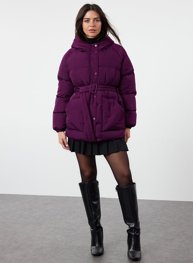 trendyol جاكيت بافر مقاوم للماء مع غطاء وحزام - برقوق عادي - Image 1