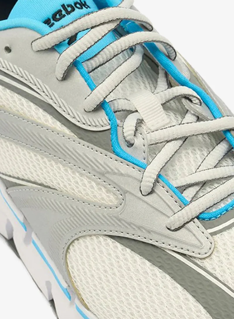 Reebok White/Future Cyan/Barely Grey Reebok Zig Hypnotica Unisex Shoes  | Best Price UAE