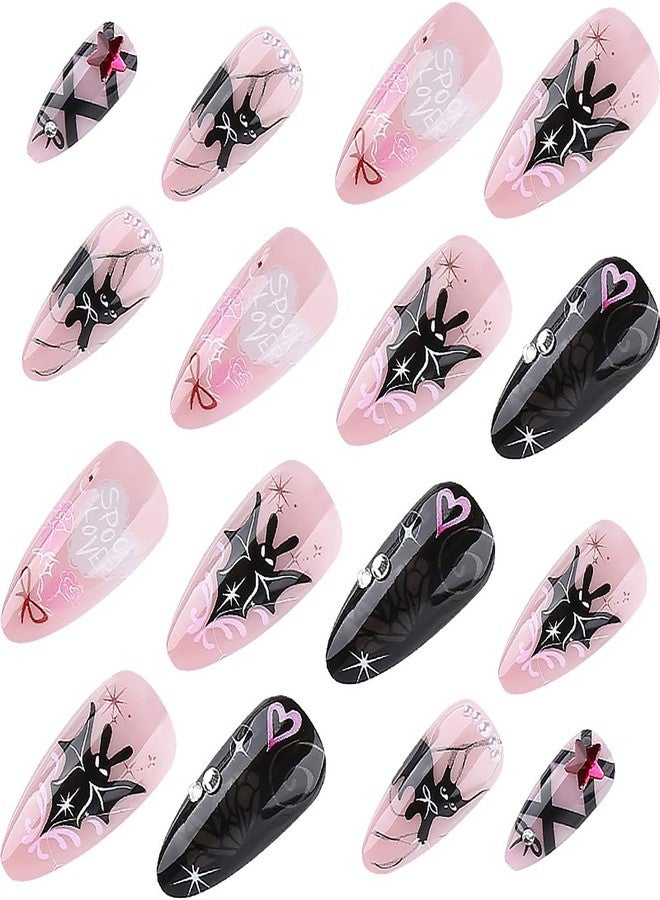 KRTBKR 24Pcs Gothic Press on Nails Medium Almond Fake Nails Cat Bow Heart with Rhinestones Gems Charms Glitter Design Full Cover Y2k Glue on Nails Black Pink False Nails for Women Artificial Acrylic Nails - Image 2