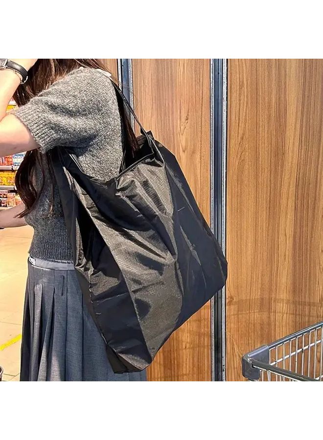 2 قطع حقيبة يد بلون سادة، متينة وقابلة للطي، قابلة لإعادة الاستخدام وخفيفة الوزن مع حزام معصم، مناسبة للبقالة والسفر والنزهات - Image 2