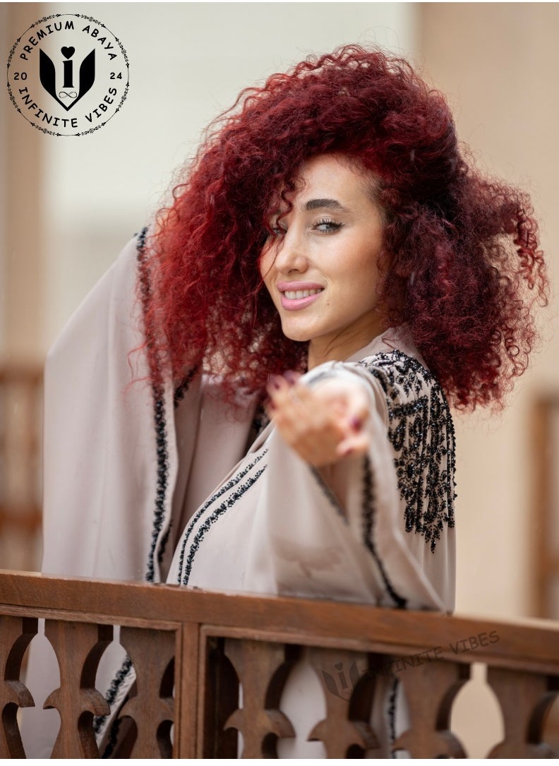 INFINITE VIBES - Exquisite Pink Nude Butterfly Abaya with Intricate Stone Embellishments - A Symbol of Elegance and Grace - Image 1