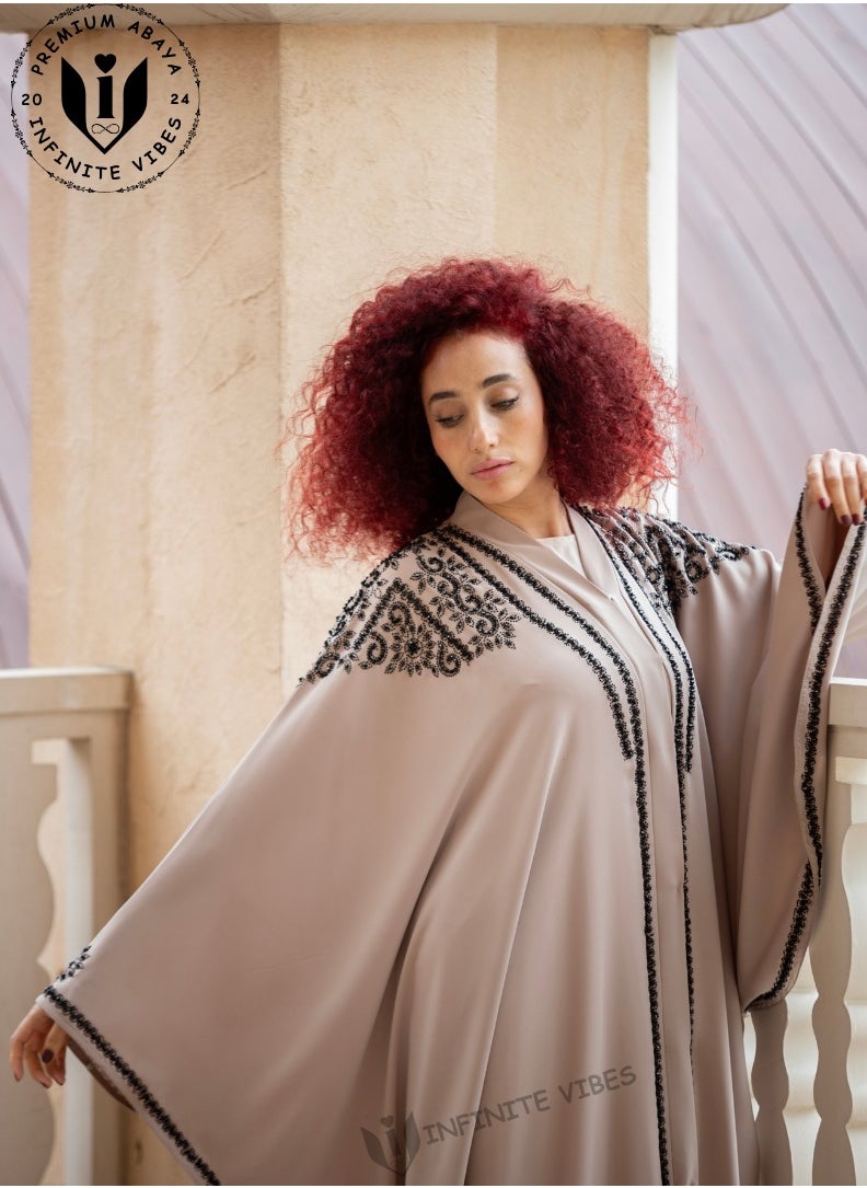 INFINITE VIBES - Exquisite Pink Nude Butterfly Abaya with Intricate Stone Embellishments - A Symbol of Elegance and Grace - Image 1