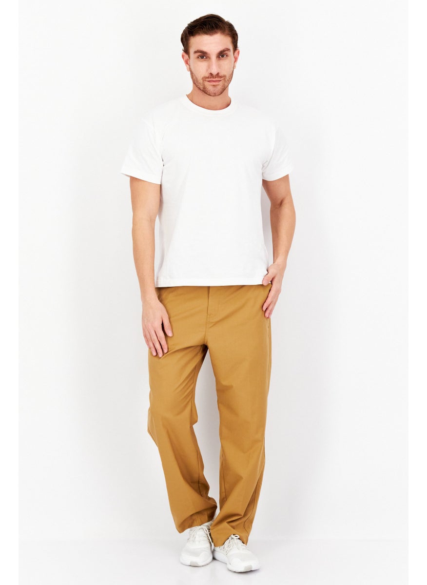 Men Regular Fit Plain Chino Pants, Tan - pzsku/Z51239B9EF05EFAD536F9Z/45/_/1724351098/e2c7259d-9a65-4cfb-afe3-3b892dd75e31