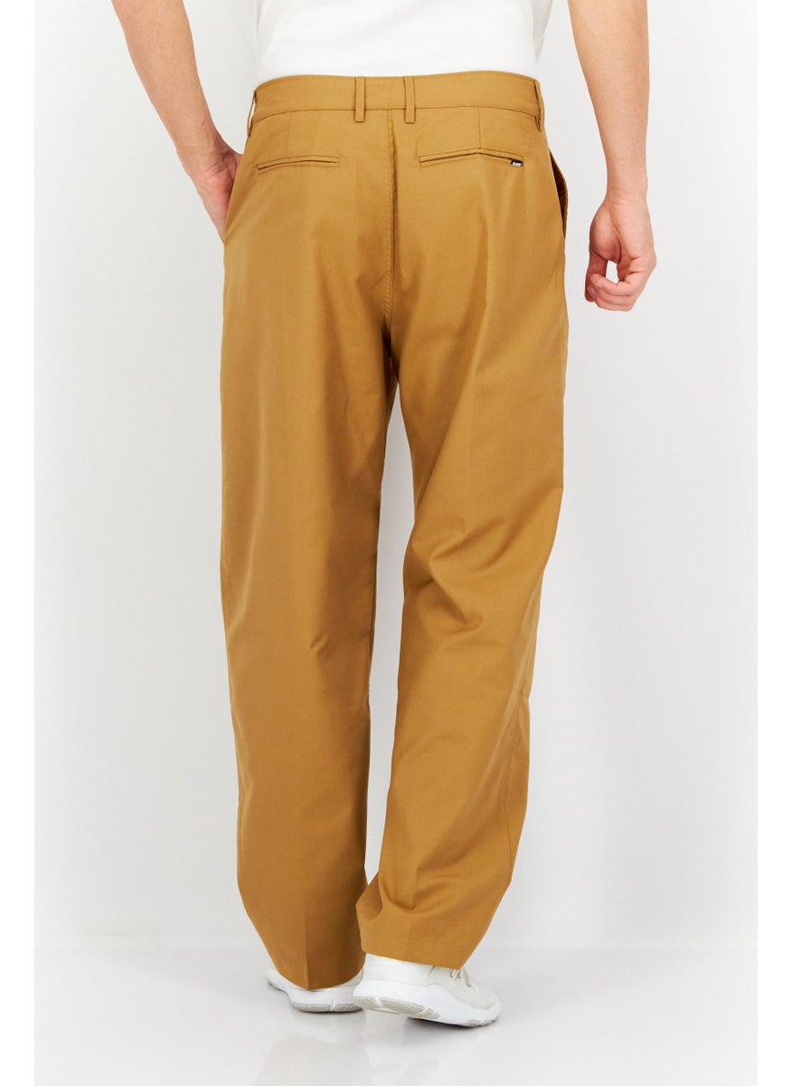 Men Regular Fit Plain Chino Pants, Tan - pzsku/Z51239B9EF05EFAD536F9Z/45/_/1724351101/e85fec54-d257-4ddb-bf81-616850306802