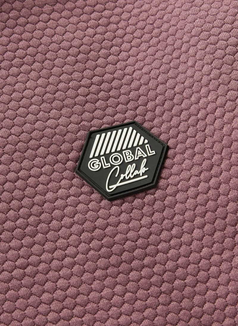 ماتلان هودي شبابي بلون الخزامى بنقشة خلية النحل