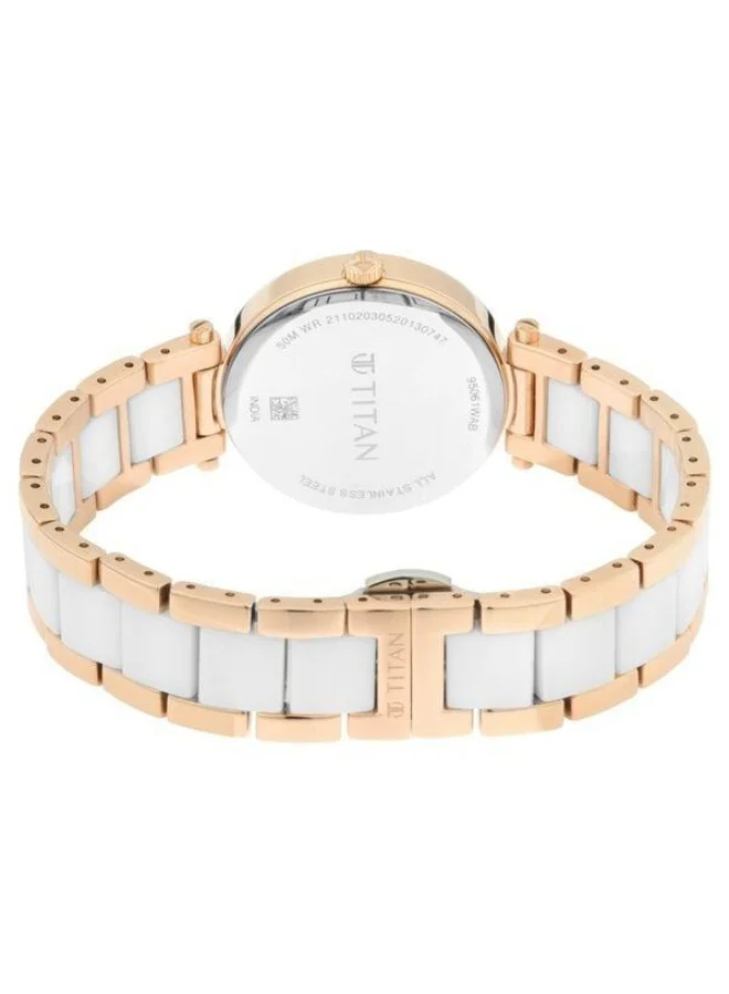 TITAN  Quartz Analog White Mother Of Pearl Dial Two Toned White Ceramic & Rose Gold Metal Strap Watch for Women - 95061WD04  | Best Price UAE