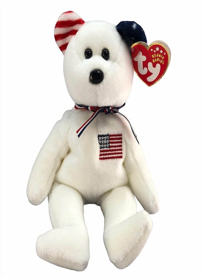 تي واي دمية دب أمريكا من مجموعة TY Beanie Babies - طولها 8.5 بوصة - لونها أبيض مع خط أحمر وأبيض على الأذن اليمنى ونجوم زرقاء وبيضاء على الأذن اليسرى - علم أمريكي على الصدر - Image 1