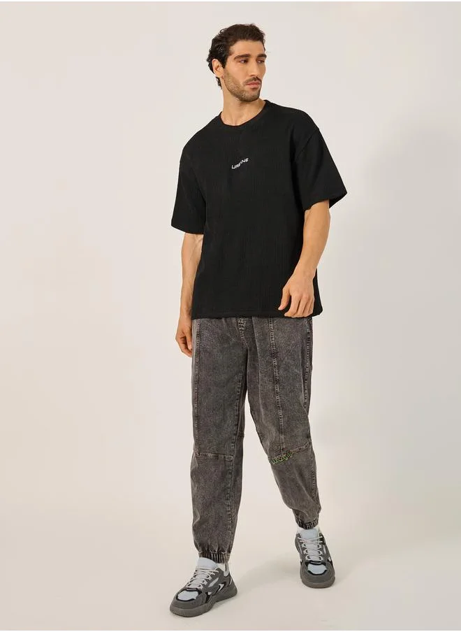 Styli Styli Textured Oversized T-Shirt with Minimal Embroidery