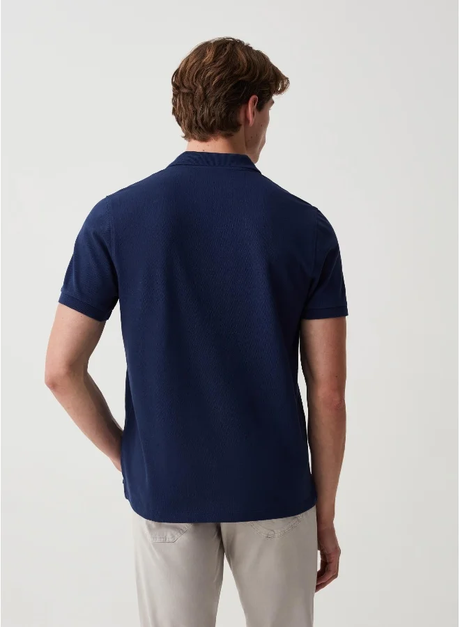 او في اس Organic cotton pique polo shirt