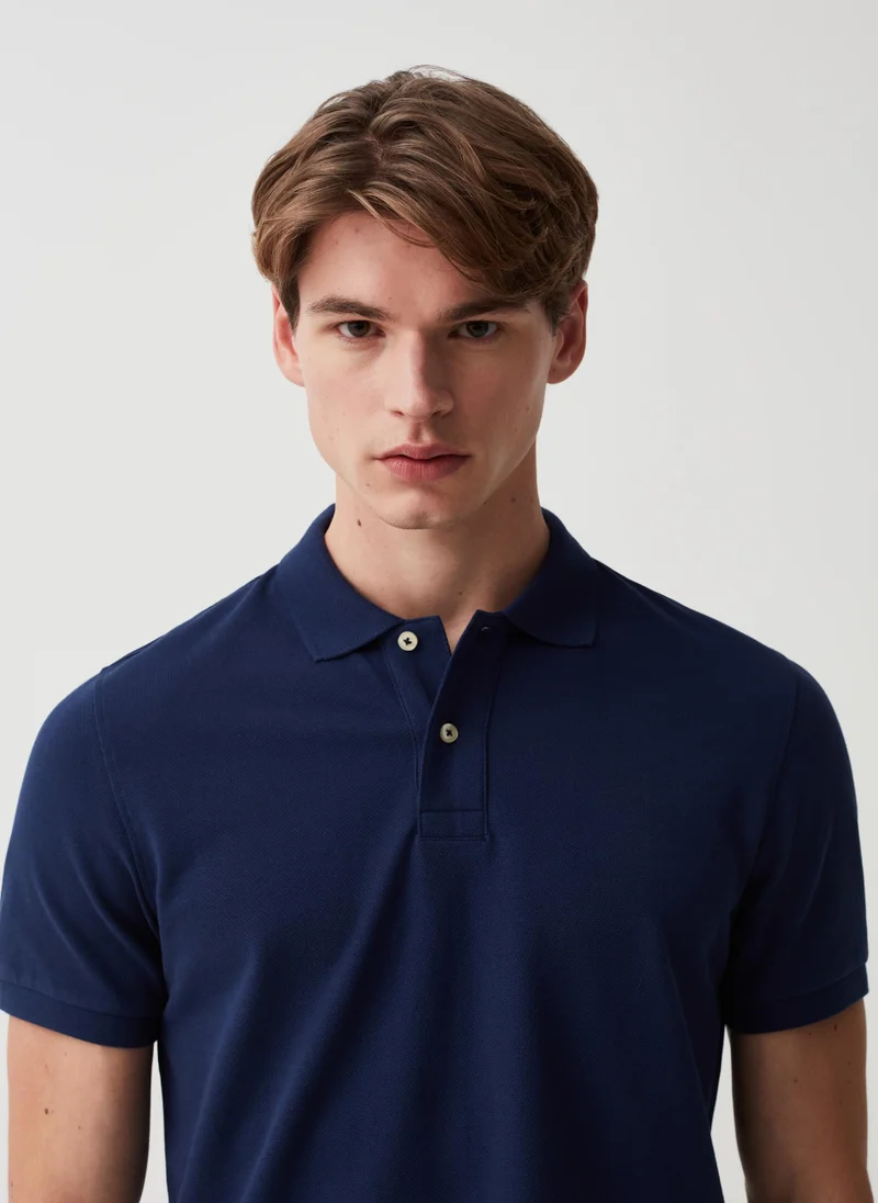 او في اس Organic cotton pique polo shirt