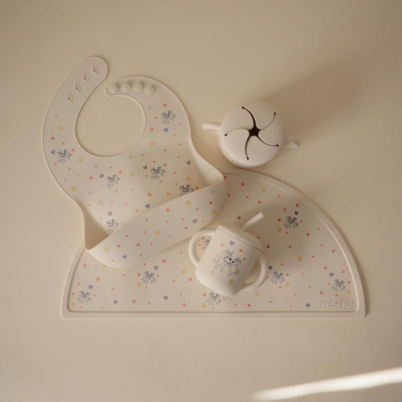mushie x Bluey Silicone Baby Bib | Adjustable Fit Waterproof Bibs (Bluey Ivory) - Image 4