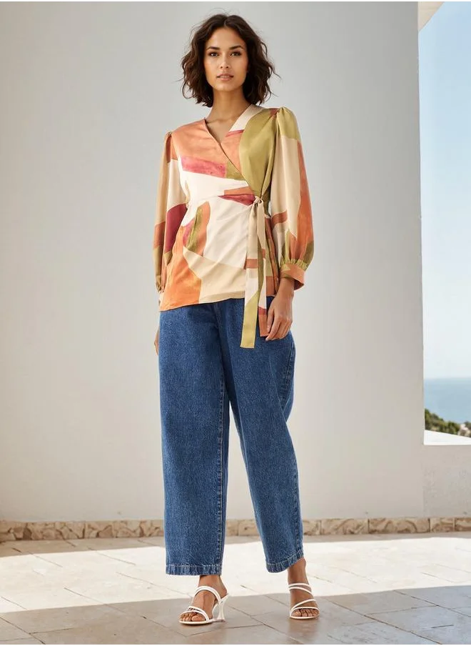 ايكونيك Iconic Printed V-neck Wrap Top with Long Sleeves and Tie-Up Detail