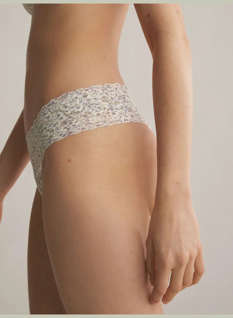 oysho Dense floral V-cut thong