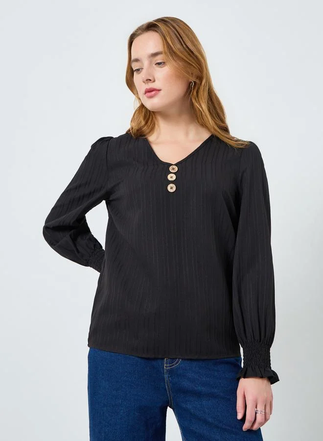 تايك تو بلوزة بأكمام طويلة بتفاصيل أزرار ونسيج بارز