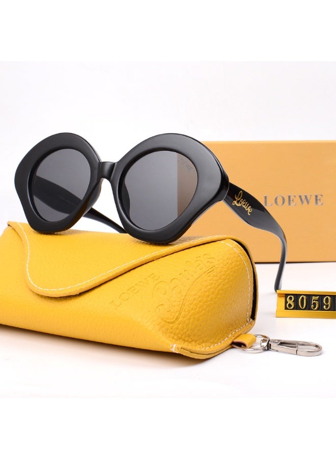 LOEWE نظارات شمسية دائرية سوداء من لوي في مع عدسات داكنة وحافظة تحمل العلامة التجارية