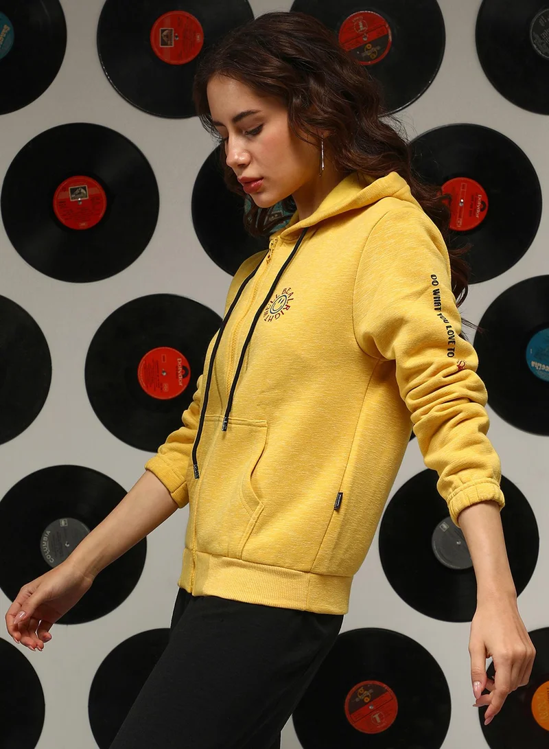 Campus Sutra Women's Saffron Yellow Zip-Front We'll Be Alright Hoodie For Casual Wear | Hooded Neck | Long Sleeves | Zipper Closure | Sweatshirt Crafted With Comfort Fit For Everyday Wear