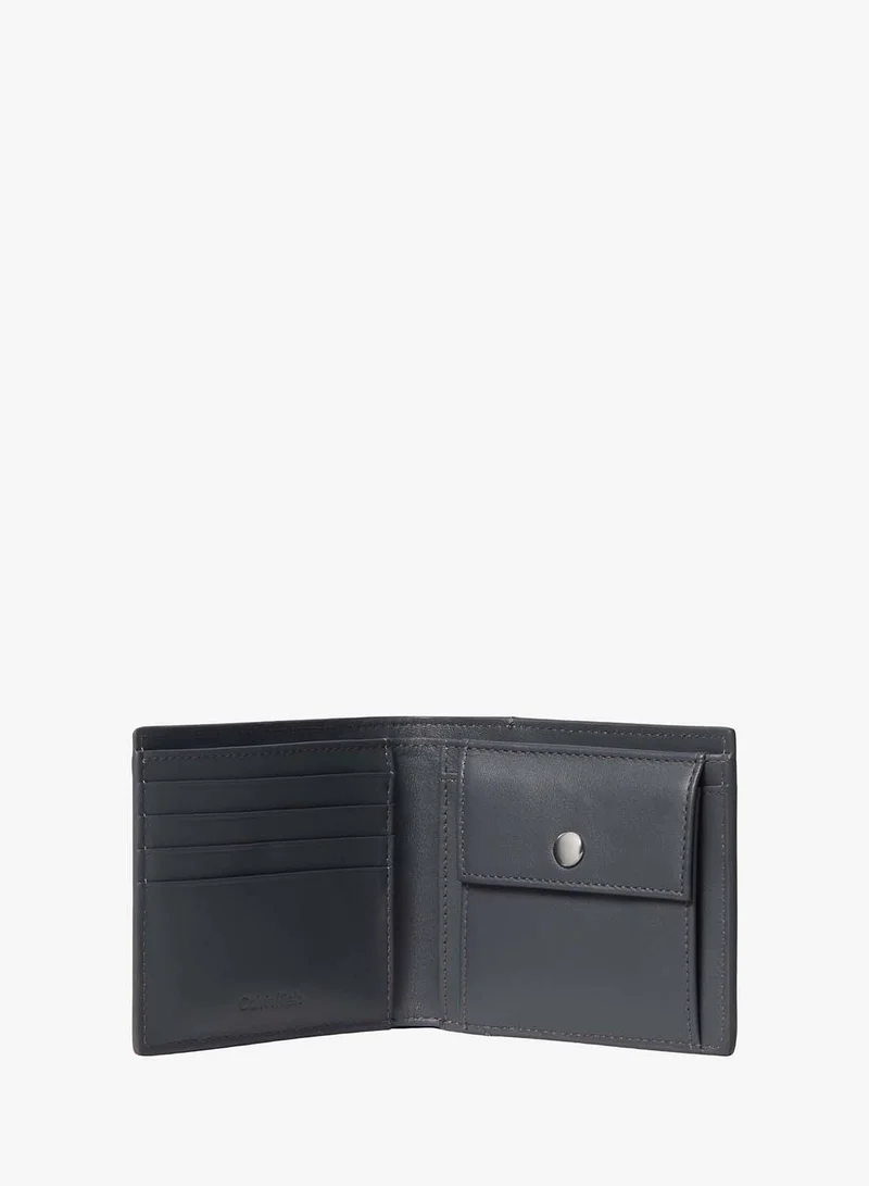 Calvin Klein Iron Gate Coated Emblem Print Bifold Wallet for Men | Best Price UAE