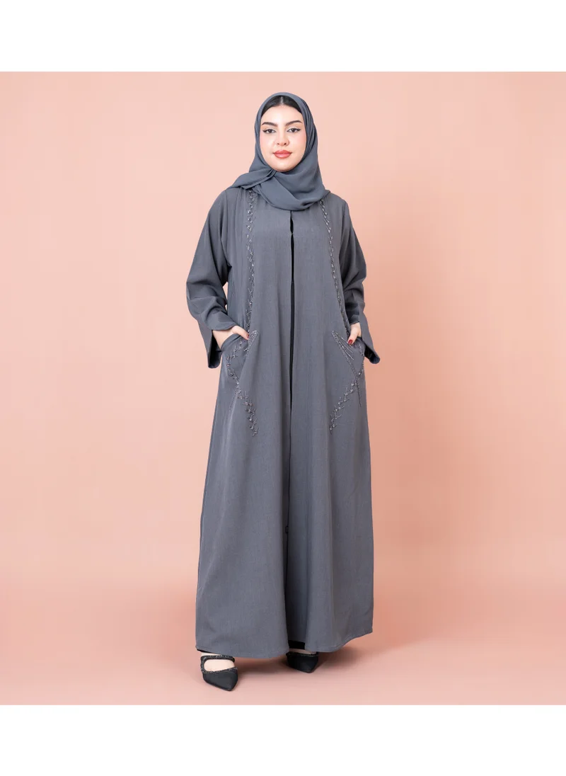اكسا عباية رسمية بجيوب مطرزة