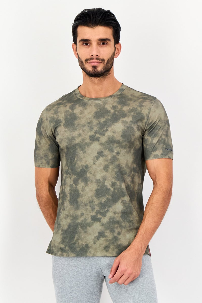 PUMA Porsche Design x Puma Men Sportswear Fit Short Sleeves Training T-shirt, Multicolor - Image 1