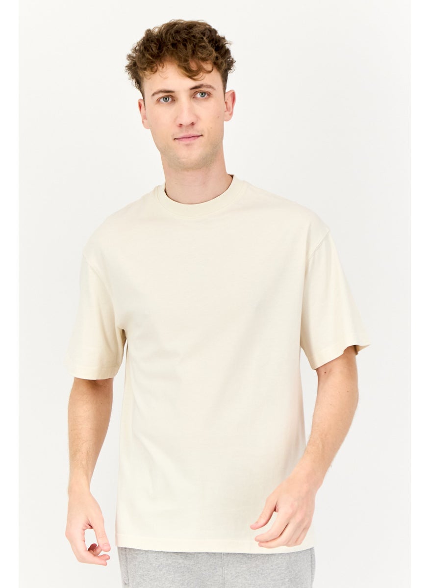 Reebok Men Sportswear Fit Short Sleeve Brand Logo Outdoor T-Shirt, Beige  - Image 1