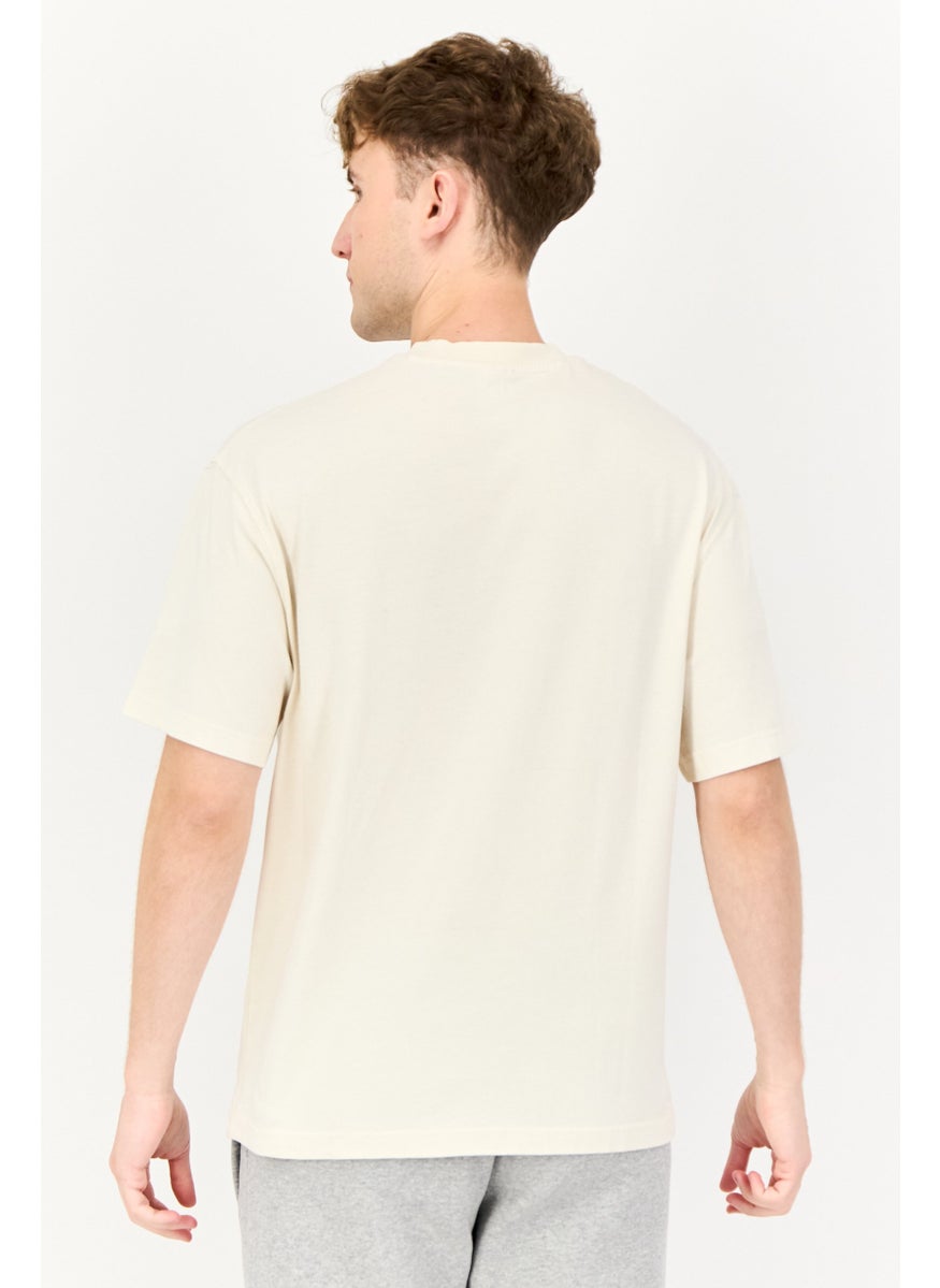 Reebok Men Sportswear Fit Short Sleeve Brand Logo Outdoor T-Shirt, Beige  - Image 3