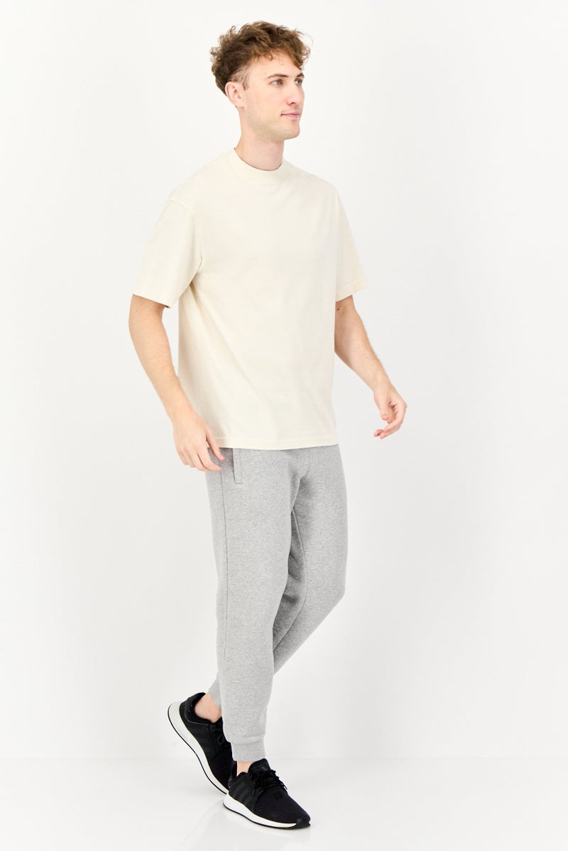 Reebok Men Sportswear Fit Short Sleeve Brand Logo Outdoor T-Shirt, Beige - Image 4