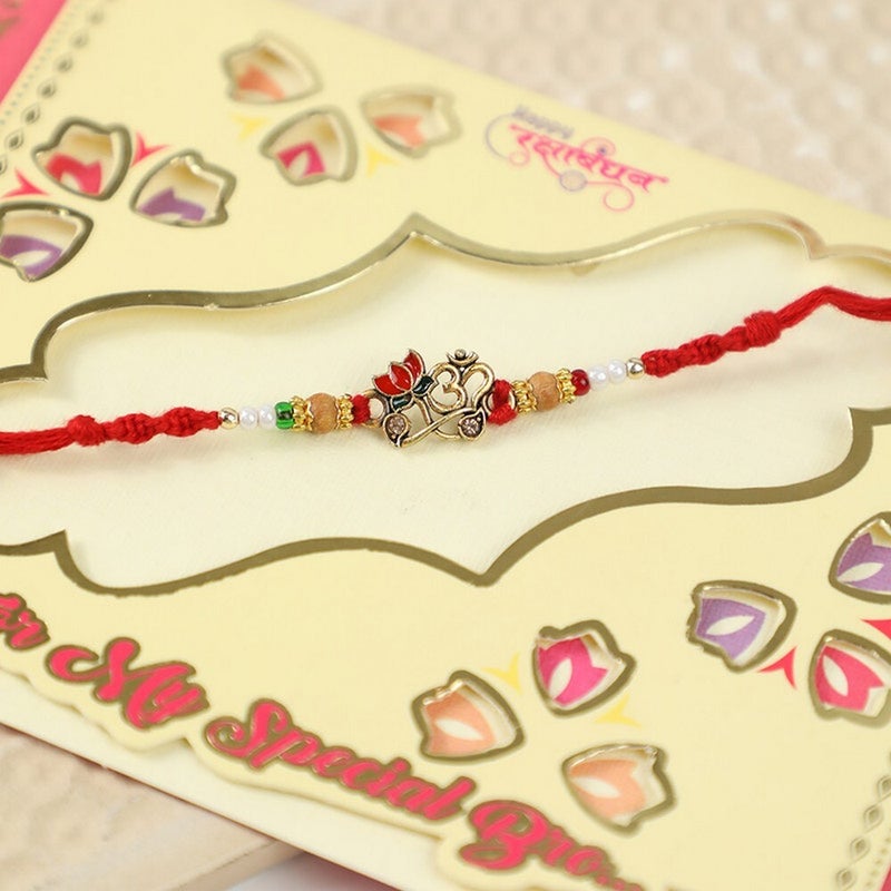 Madhoor Traditional Handcrafted Rakhi with Om and Lotus Design, Premium Thread Rakhi for Brother, Festive Raksha Bandhan Rakhi, 20 cm - Image 1